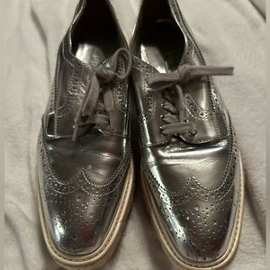 Prada size 9 great condition slight wear on toe area lots of wear left in these